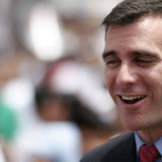 Eric Garcetti Smiling in a Suit and Tie