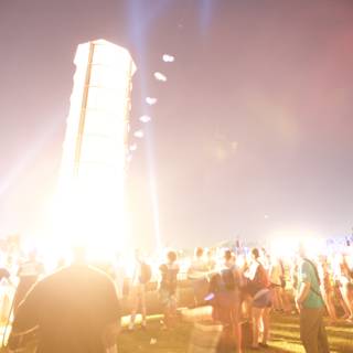 Flare of Fire Lights Up Urban Crowd
