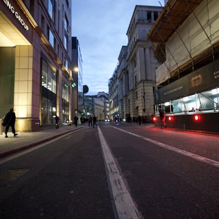 Evening Rush Hour on London's Financial District Street