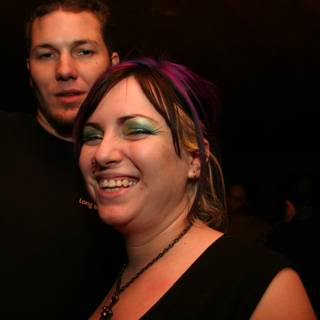 Smiling Couple at Urban Nightclub Party