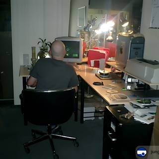The Busy Man at His Desk
