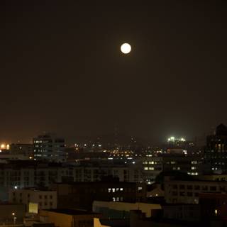 A Celestial Night Scene Over the Metropolis