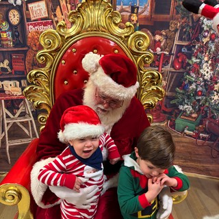 Santa's Workshop Visit with Two Young Children
