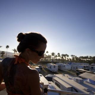 Tattooed Woman Overlooking Coachella Parking Lot