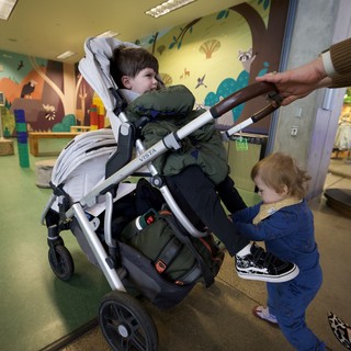 Child in Specialized Stroller at Children's Therapy Center
