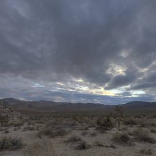 Majestic Mountains Meet Moody Skies