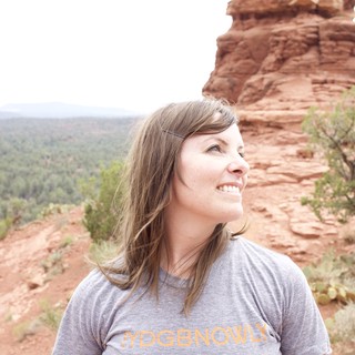 Woman Smiling Among Sedona's Red Rock Formations