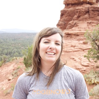Smiling Hiker Poses Among Sedona Red Rock Formations