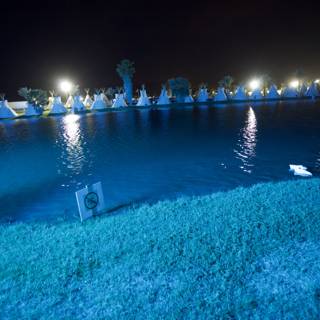 Illuminated Pond at a Resort
