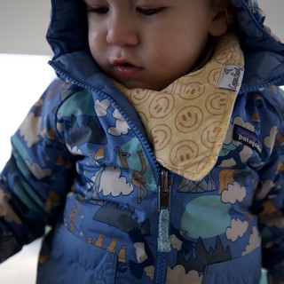 Young Child in Blue Patterned Winter Jacket