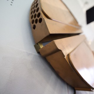 Geometric Brass-Colored Bookends with Honeycomb Pattern