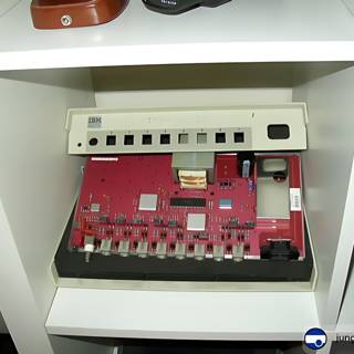 Showcasing computer and electronic hardware in a stylish cupboard