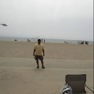 Walking on the Beach with a Helicopter and a Chair