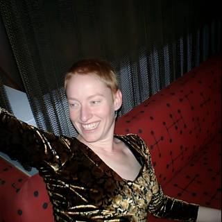 Redheaded Woman Relaxing on Velvet Couch