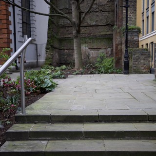 Weathered Stone Steps Leading to Historic Courtyard