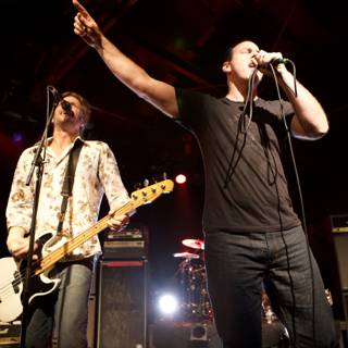 Two Men Rocking Out on Stage at the 2007 Bad Religion Glasshouse Concert