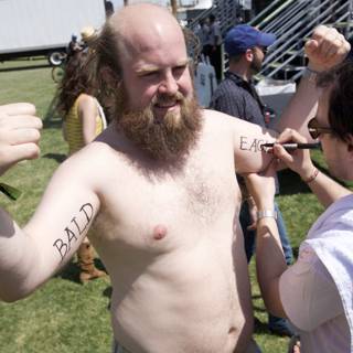 Chest Tattooed Man at Coachella