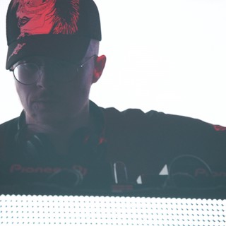 DJ Performing Behind Pioneer Decks at Wobbleland