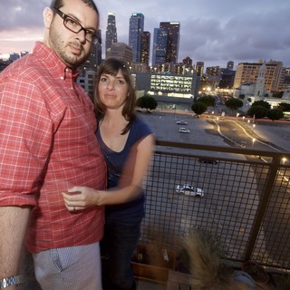 Couple's Evening Portrait with Los Angeles Downtown Skyline