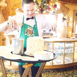 Bavarian Chef Preparing Fresh Popcorn at Holiday Market