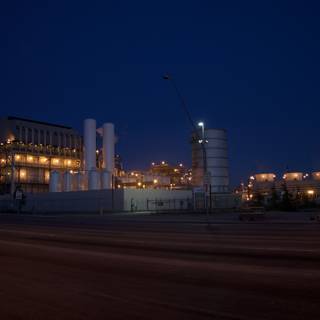 Illuminated Power Plant at Night