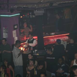 Urban Nightlife: A Crowd of Party-goers in a Nightclub