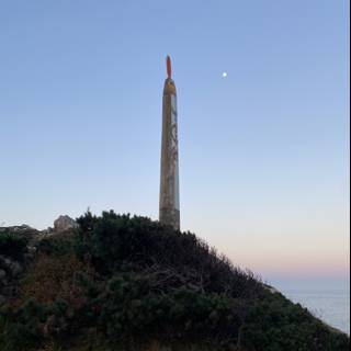 Monument on a Hill with the Glow of the Moon