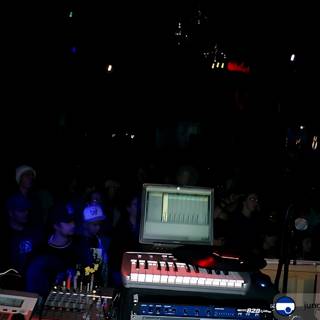 Keyboard Performance in a Lit Nightclub
