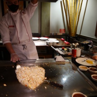 Chef Preparing Heart-Shaped Fried Rice at Teppanyaki