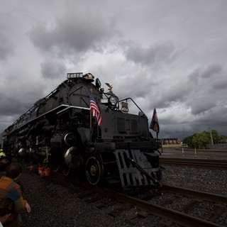 Historic Big Boy Locomotive on Display Under Stormy Skies