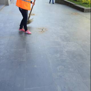 Sweeping the Sidewalk