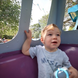 Toddler Playing at Colorful Fantasyland Playground