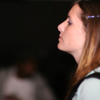 Woman in Profile Gazing Into the Darkness