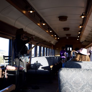Vintage Train Car Interior with Scenic Mountain Views