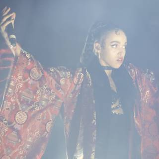 FKA Twigs Shines Bright in Red Robe and Black Jacket on Stage