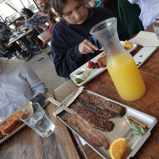 Family Brunch with Sausages and Orange Juice