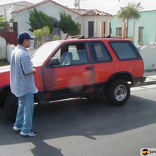 Red SUV and a Man