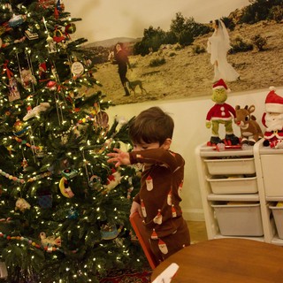 Child's Joyful Christmas Morning by the Tree