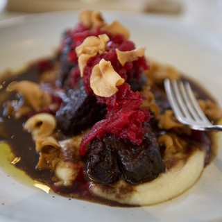 Gourmet Short Ribs with Crispy Garnish and Cream