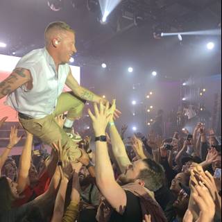 Crowd Surfing at the Rock Concert