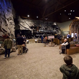 Historic Steam Locomotive Display in Museum Cave Setting