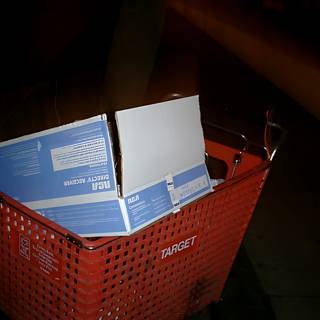 Red Shopping Cart of Papers