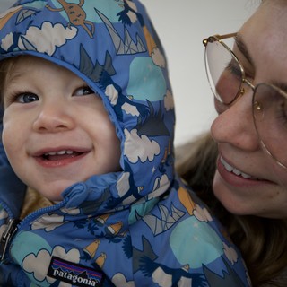 Joyful Winter Moment: Mother and Child Bonding