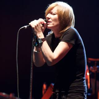 Beth Gibbons steals the show Caption: Singer Beth Gibbons electrifies the crowd with her powerful solo performance at Coachella in 2008.