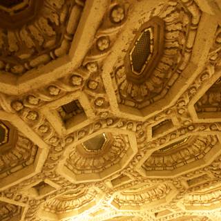 Intricate carvings on theater ceiling