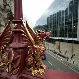 Red Dragon Guardian Overlooking London Street