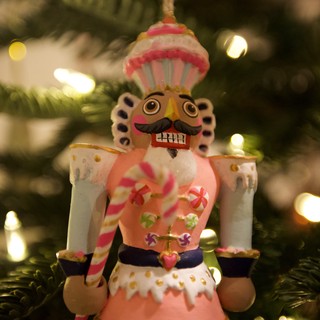 Whimsical Nutcracker Ornament on Decorated Christmas Tree