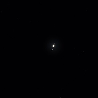 Jupiter and Its Galilean Moons in Night Sky
