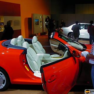 Red Convertible and Man at LA Auto Show