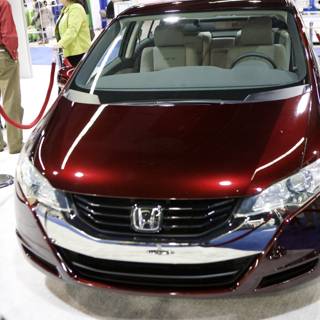 Red Honda Sports Car Shines at Car Show